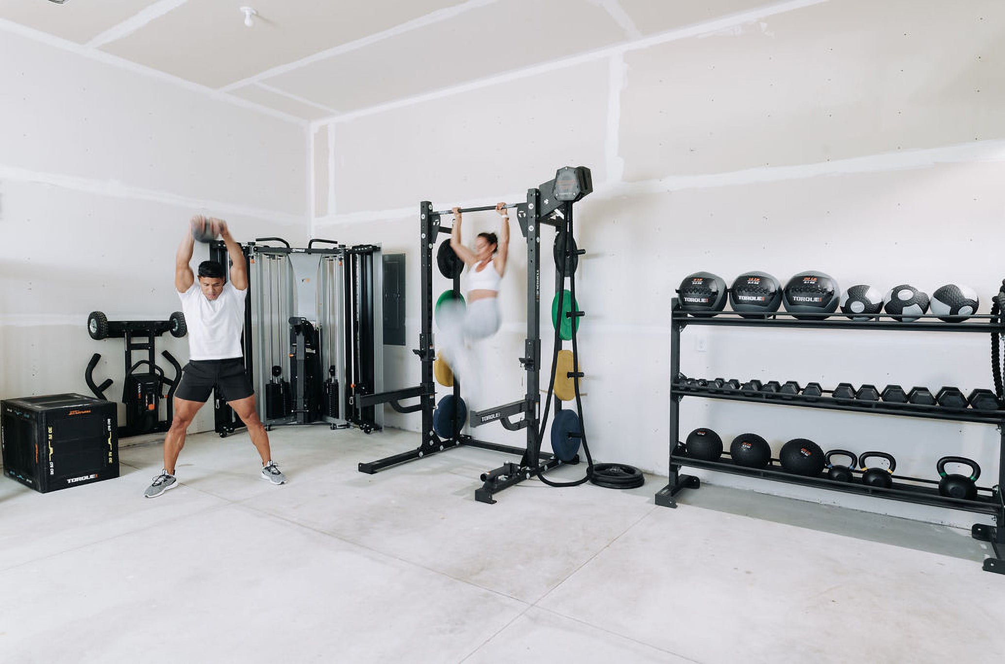 Woman Training On Torque Rack