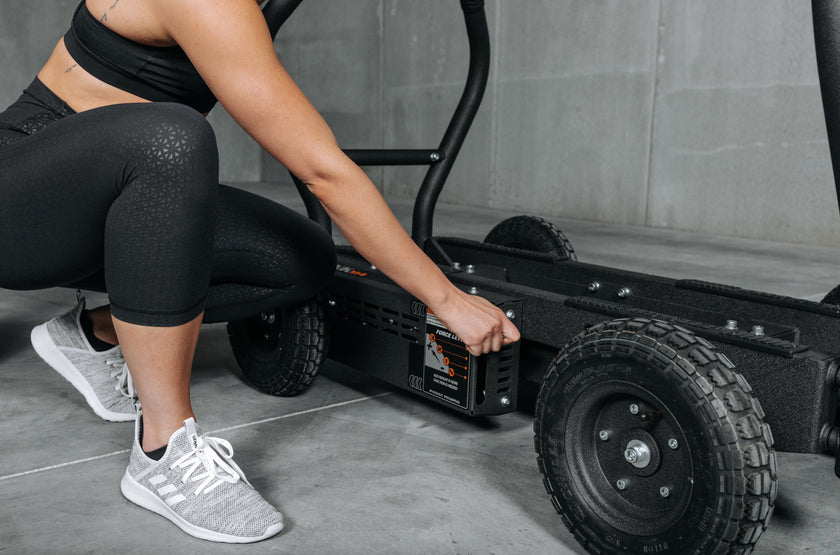 Woman Adjusting TANK M4 Mag Force Resistance Level for Training