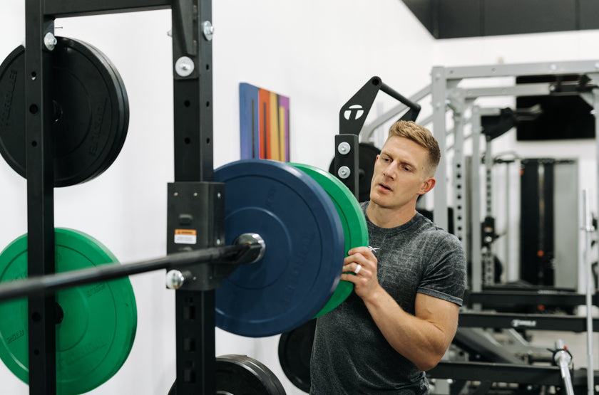 Brent Fikowski Loading Plates Onto Torque Rack