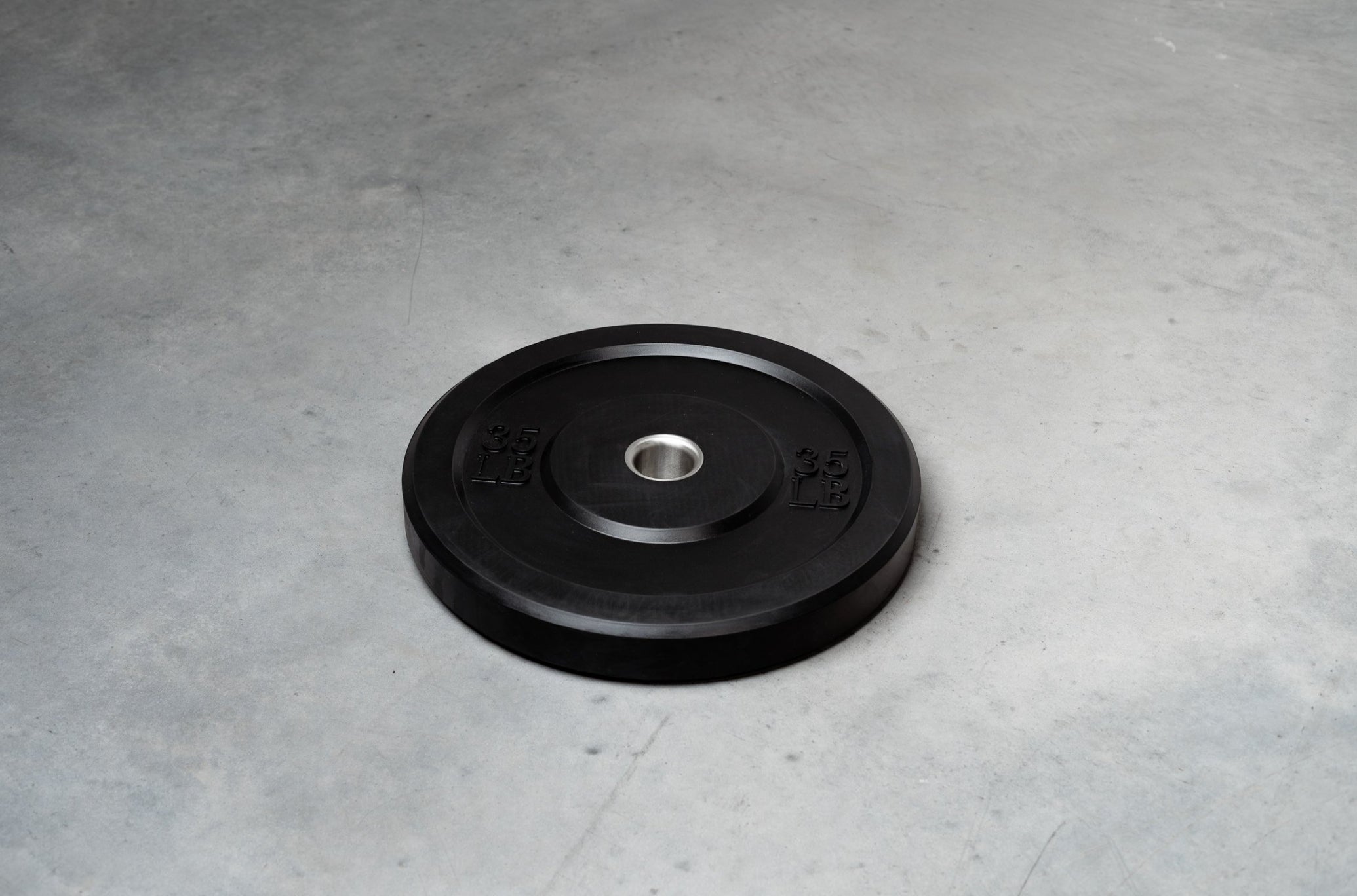 Torque 35 lb Black Bumper Plate