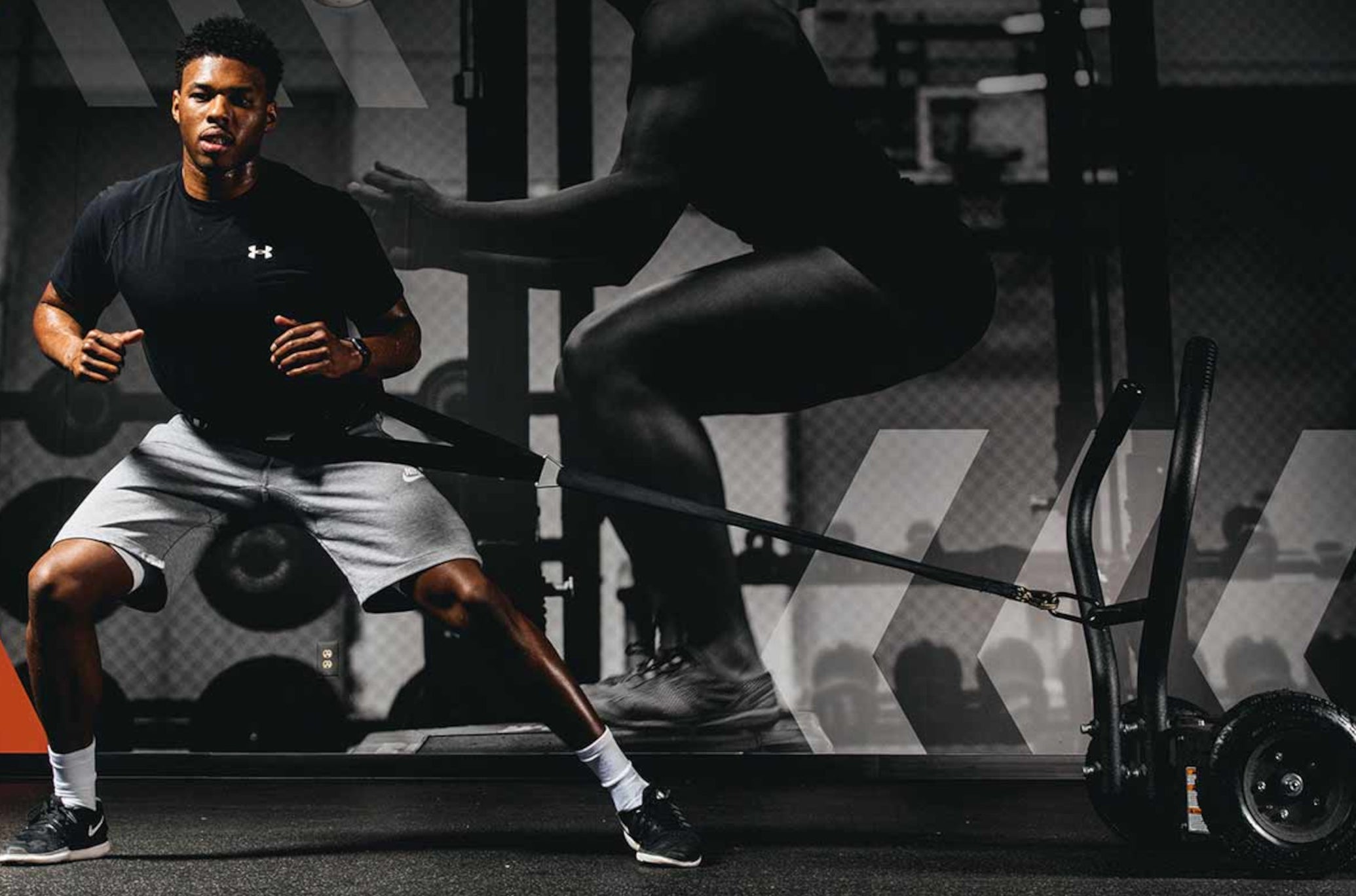 Man Working Out With TANK and Accessories